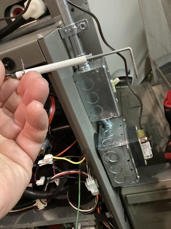 Completed comprehensive tune-up service on residential split HVAC system including furnace and air conditioning condenser unit. Performed refrigerant pressure diagnostics using manifold gauges on outdoor AC unit, inspected electrical connections and junction box wiring at furnace, and verified all components operating within manufacturer specifications.