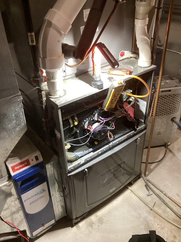Completed furnace and air conditioning tune-up maintenance on residential HVAC system. Performed comprehensive inspection of furnace unit, verified electrical connections and wiring integrity, tested control systems, inspected humidifier operation, checked refrigerant lines and condensate drainage system, and confirmed all components operating within manufacturer specifications.