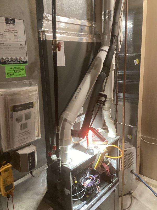 Completed furnace and air conditioning tune-up maintenance on residential HVAC system. Performed comprehensive inspection of furnace unit, verified electrical connections and wiring integrity, tested control systems, inspected humidifier operation, checked refrigerant lines and condensate drainage system, and confirmed all components operating within manufacturer specifications.