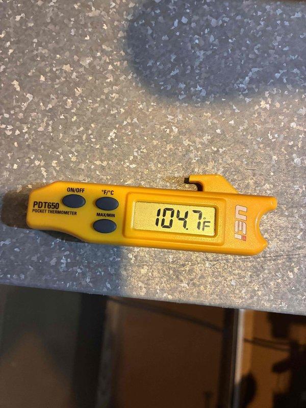 Performed scheduled tune-up maintenance on air conditioning system and furnace unit. Conducted electrical diagnostics using multimeter to verify proper voltage and amperage readings at control panel, confirming all electrical connections were secure and within manufacturer specifications. Measured supply air temperature at 104.7°F to verify system heating capabilities and proper operation of heat exchanger components.