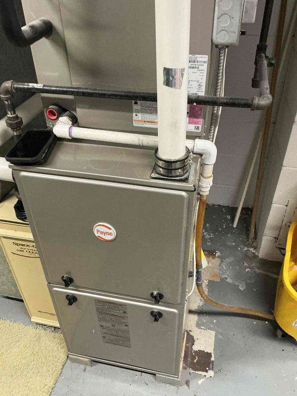 Completed annual heating maintenance on 15-year-old Payne furnace system. Performed comprehensive tune-up including visual inspection of all accessible components, burner assembly, heat exchanger, and venting system. Utilized borescope camera to conduct thorough internal inspection of heat exchanger and ductwork for cracks, corrosion, or blockages—no issues detected. Verified all electrical connections, tested safety controls, and confirmed proper operation of gas valve and ignition system. Inspected PVC venting for proper drainage and secure connections. System operating within manufacturer specifications with no immediate repairs required.