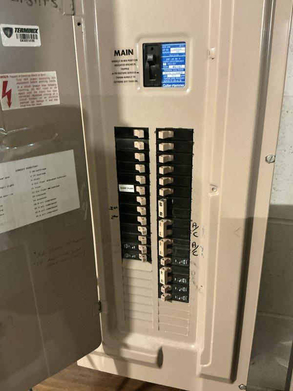 Provided estimate for replacement of two natural gas furnaces and two air conditioning units, both systems located in basement. Documented existing electrical panel configuration and photographed main breaker panel to assess electrical capacity for new HVAC equipment installation.
