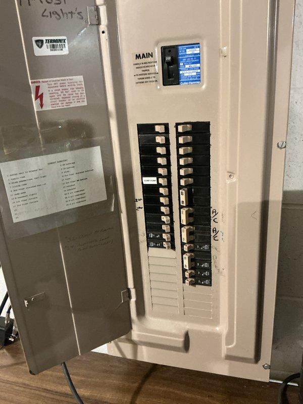 Provided estimate for replacement of two natural gas furnaces and two air conditioning units, both systems located in basement. Documented existing electrical panel configuration and photographed main breaker panel to assess electrical capacity for new HVAC equipment installation.
