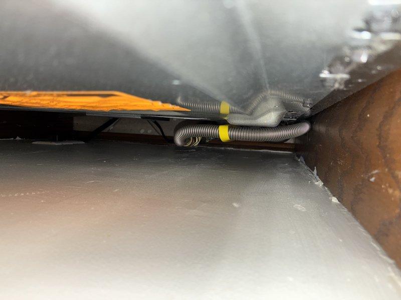 Responded to service call for leaky gas pipes at residential property. Upon arrival, accessed crawl space and mechanical room to inspect gas line system serving water heater and HVAC equipment. Located gas leak on corrugated flexible gas connector line running through confined space near structural supports. Performed pressure test on gas system to verify leak location and ensure no additional compromised connections. Replaced defective flexible gas line with new approved connector, secured all fittings, and applied leak detection solution to verify integrity of repair. Conducted final pressure test on entire gas distribution system to confirm proper operating pressure and absence of leaks at all connection points. Restored gas service to water heater and furnace, verified proper operation of both appliances, and confirmed no additional issues with gas piping system.
