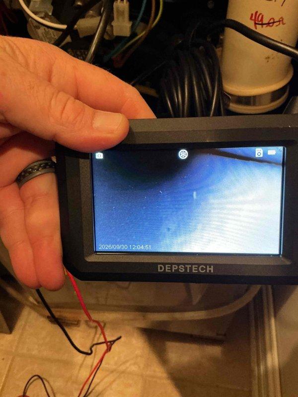 Performed comprehensive furnace tune-up and inspection using borescope camera to examine internal components and heat exchanger for cracks or deterioration. Accessed unit through attic space, verified all electrical connections, tested safety controls, and confirmed proper system operation with all components functioning within manufacturer specifications.