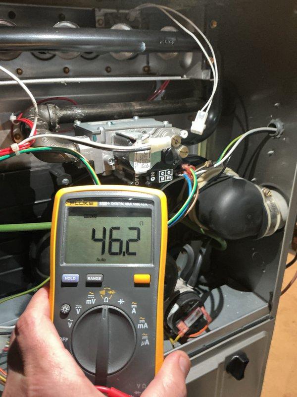 Completed preventative maintenance tune-up on 9-year-old Bryant furnace system. Performed comprehensive system diagnostics including electrical testing with multimeter, measuring voltage readings at 46.2V on heating components. Inspected and tested ceramic resistor/fuse component, examined all electrical connections and wiring harness throughout the unit, and verified proper operation of blower motor assembly. All components found to be functioning within normal parameters and system is ready for the upcoming heating season.