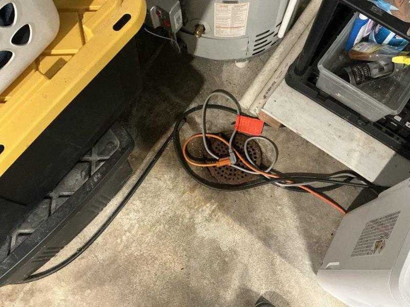 Conducted on-site evaluation for HVAC system replacement estimate. Assessed aging outdoor air conditioning condenser unit with visible weathering and deterioration, along with natural gas furnace located in basement showing advanced age but currently operational. Documented existing equipment conditions through photographic inspection and provided updated pricing options for complete system replacement both through membership warehouse program and standard retail channels.
