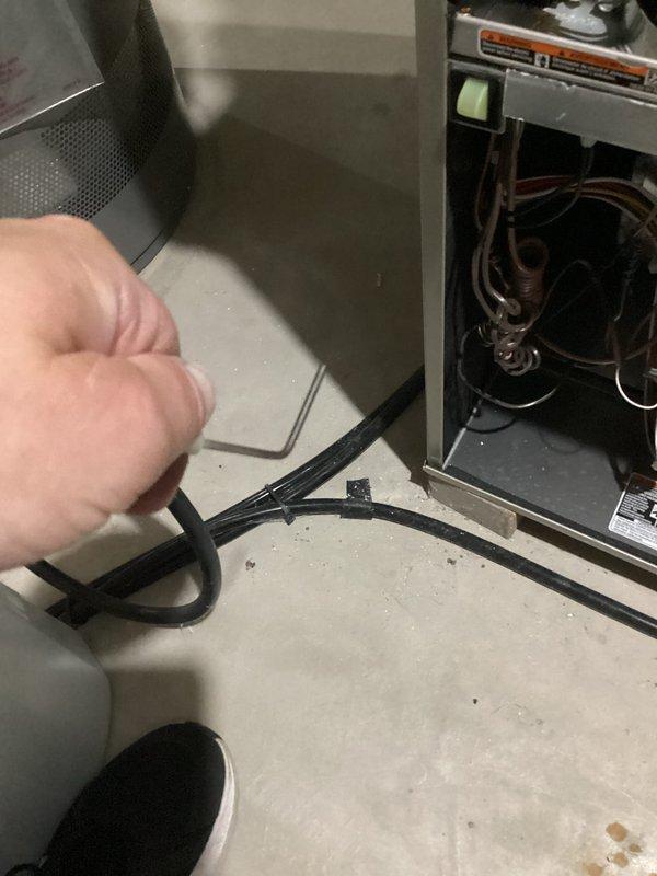 Completed comprehensive furnace tune-up and system inspection, including cleaning and checking all major components. Serviced condensate drain trap assembly, inspected blower housing and motor assembly, and secured electrical wiring with cable ties to ensure safe operation. All equipment tested and verified to be functioning within normal operating parameters.