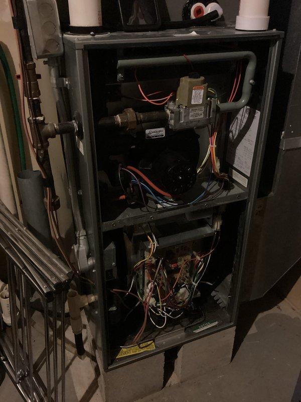 Completed comprehensive furnace tune-up and safety inspection. Performed combustion analysis using flue gas analyzer, confirming system efficiency at 91.9% with oxygen levels at 9.6%, carbon monoxide at 42 ppm, and stack temperature at 107.4°F. Inspected all internal components including gas valve assembly, blower motor, electrical connections, and wiring harnesses, verifying proper operation and safety compliance.