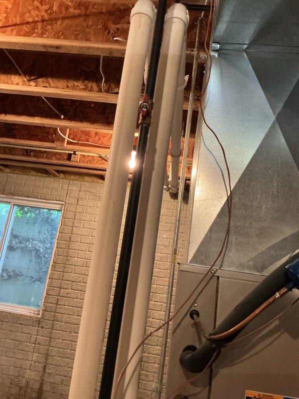 Completed full tune-up maintenance on residential HVAC system in basement utility area. Performed comprehensive system diagnostics using Testo 310 combustion analyzer to verify proper operation, efficiency, and safety parameters. Customer provided replacement filter for installation during service visit.