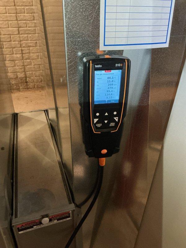 Completed full tune-up maintenance on residential HVAC system in basement utility area. Performed comprehensive system diagnostics using Testo 310 combustion analyzer to verify proper operation, efficiency, and safety parameters. Customer provided replacement filter for installation during service visit.