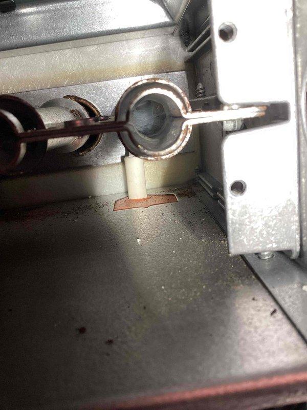 Responded to no heat call on residential furnace system. Upon arrival, confirmed unit was running but producing only cold air. Performed diagnostic inspection and discovered flame sensor rod had excessive oxidation buildup preventing proper flame detection. Removed and cleaned flame sensor, reassembled burner assembly, and tested system operation. Unit now heating properly with burner igniting and flame sensor confirming proper combustion. Verified temperature rise across heat exchanger within manufacturer specifications and confirmed all safety controls functioning correctly.