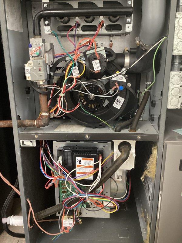 Completed comprehensive tune-up service on residential split system, including both air conditioning and furnace components. Performed thorough inspection of furnace heat exchanger assembly, blower motor operation, and all electrical connections within the air handler cabinet. Verified proper operation of control board, safety switches, and all wiring harnesses, ensuring all connections were secure and system components functioning within manufacturer specifications.