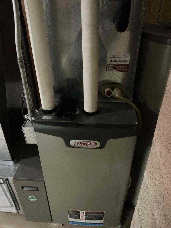 Completed full tune-up and system inspection on Lennox high-efficiency gas furnace. Measured supply air temperature and airflow at registers using digital instruments to verify proper system operation. Performed comprehensive visual inspection of unit cabinet, PVC intake/exhaust venting, electrical connections, and associated components to ensure all equipment operating within manufacturer specifications.