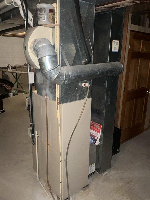 Responded to emergency service call for HVAC system evaluation. Conducted comprehensive assessment of existing furnace, humidifier, and air conditioning equipment in basement mechanical room. Provided detailed replacement estimate for heating and cooling system components based on equipment age, condition, and homeowner requirements.