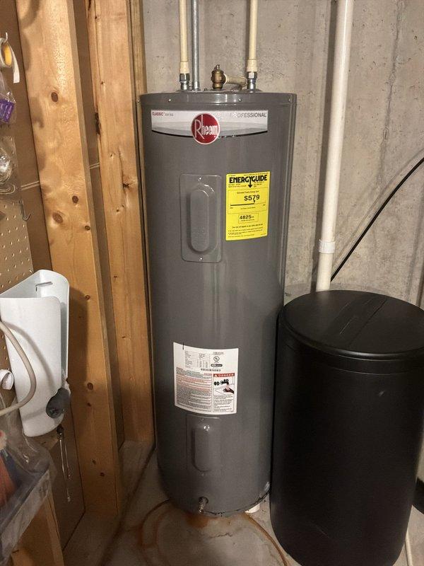 Provided estimate for replacement of leaking Rheem Professional model PROE502-RH9150 50-gallon electric water heater located in basement utility area. Prepared detailed materials list including new 50-gallon electric water heater, expansion tank with adapter, CPVC and copper press fittings, and necessary piping materials for complete installation.