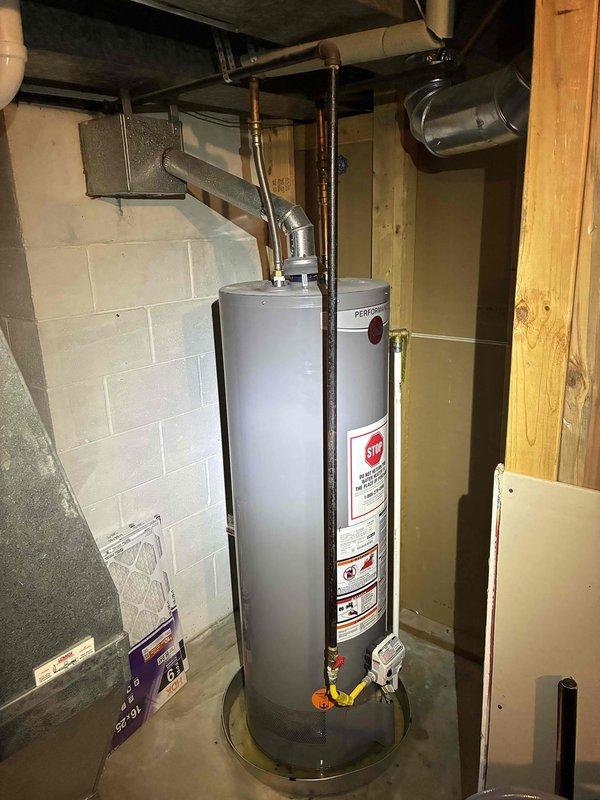 Responded to no hot water call and performed comprehensive assessment of existing gas-fired water heater system. Documented current installation including copper supply piping, braided stainless steel flex connectors, gas line configuration with yellow CSST, and exhaust venting. Observed corrosion and discoloration on pipe fittings and connections indicating age-related deterioration. Evaluated all plumbing connections, gas supply components, and venting system. Provided detailed estimate for complete water heater replacement including removal of existing unit and installation of new equipment with necessary code-compliant connections.