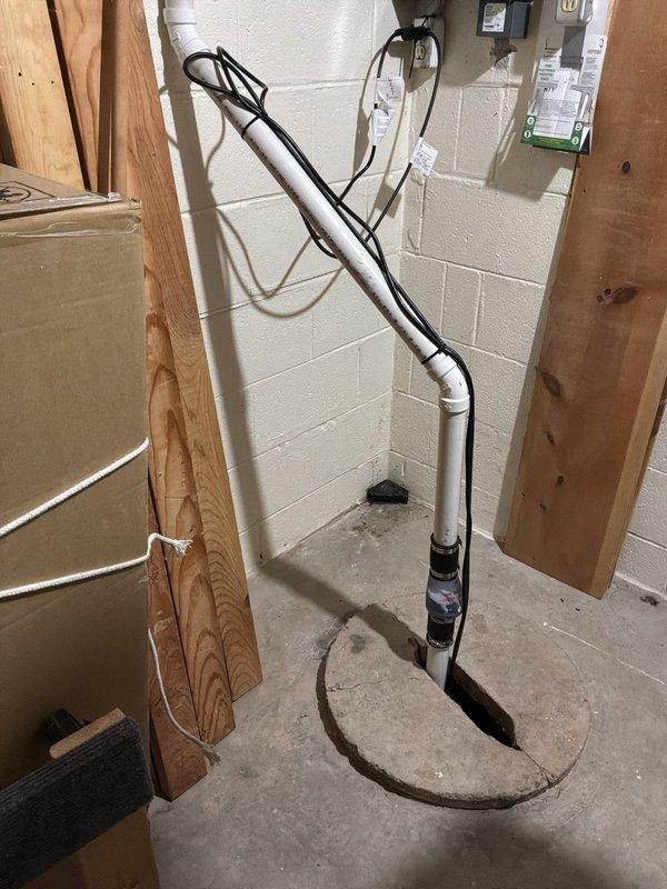 Conducted plumbing estimate for reverse osmosis system installation in basement utility area where customer was having new furnace, air conditioning unit, and water heater installed. Assessed existing copper water supply piping with shutoff valves and evaluated PVC drain line configuration to determine optimal placement and connection points for RO system. Documented current plumbing infrastructure including water supply lines, drainage routing, and available space near existing mechanical equipment to provide comprehensive estimate for system installation.