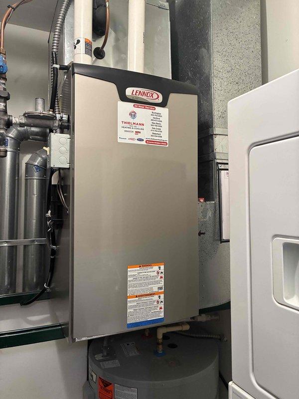 Completed comprehensive tune-up service on Lennox furnace system in residential mechanical room. Performed full system inspection including visual assessment of furnace unit, ductwork connections, electrical wiring, control components, and safety systems. All equipment found in good operating condition with proper installations and connections verified. System tested and confirmed operational with no issues identified requiring immediate attention.