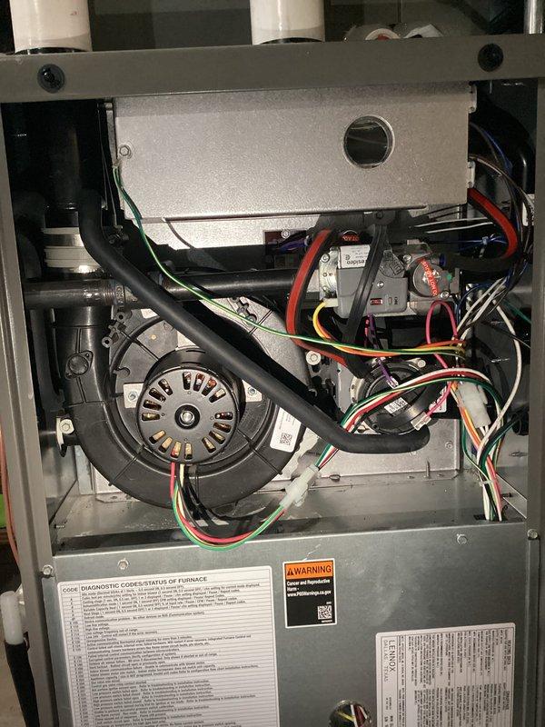 Completed comprehensive tune-up on residential forced air furnace system. Performed thorough inspection of blower motor assembly, heat exchanger, electrical connections, and all internal components with access panel removed for detailed evaluation. All systems found to be operating within normal parameters with no deficiencies noted; unit is clean, well-maintained, and functioning properly.