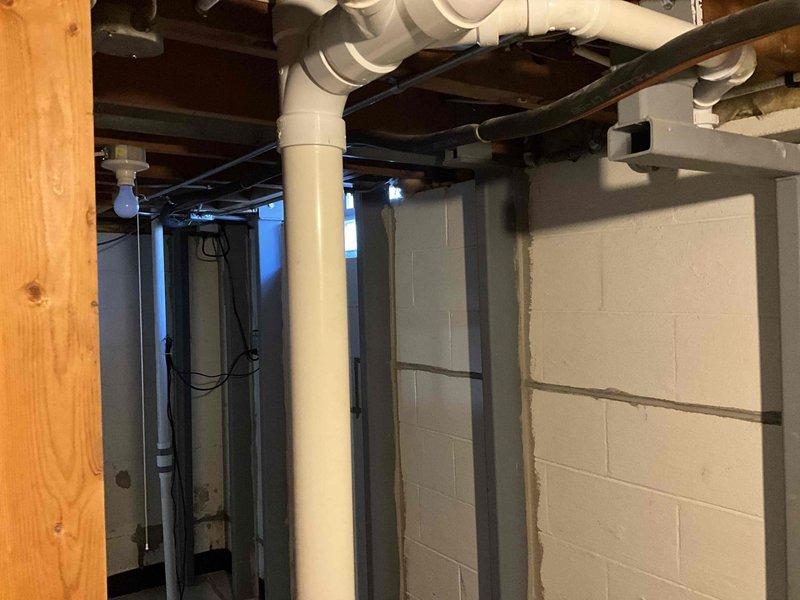 Completed estimate for replacement of aging HVAC system including natural gas furnace and air conditioning unit. The existing furnace, manufactured in 1997 and located in the basement, remains operational but has reached end of service life. The outdoor condenser unit shows visible deterioration with significant rust on fan components and motor mounting areas. Provided comprehensive replacement options for both heating and cooling equipment to address the aging system and improve efficiency and reliability.