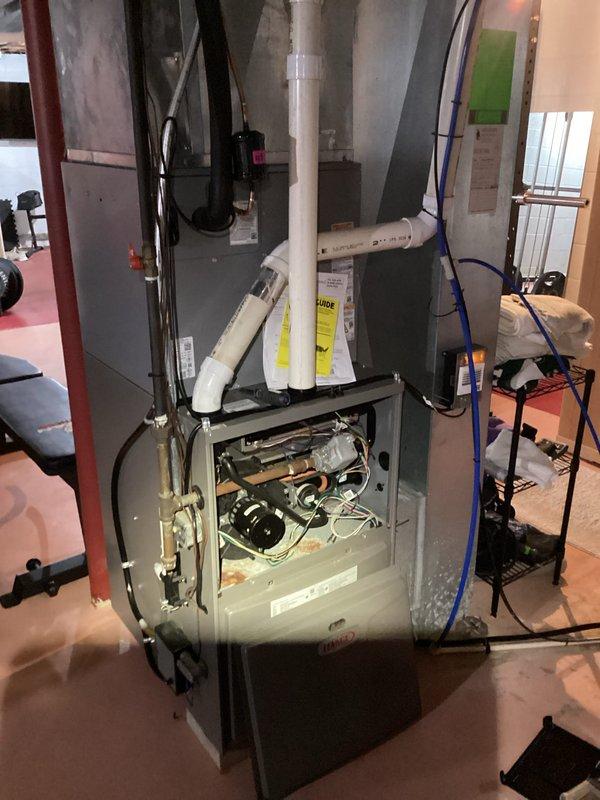 Performed second opinion inspection on residential gas furnace following report of failed heat exchanger from another contractor. Conducted thorough visual examination of furnace cabinet, internal components, blower assembly, and heat exchanger for cracks or deterioration. Documented unit condition and findings with photographs for customer records and verified operational status of all accessible components.