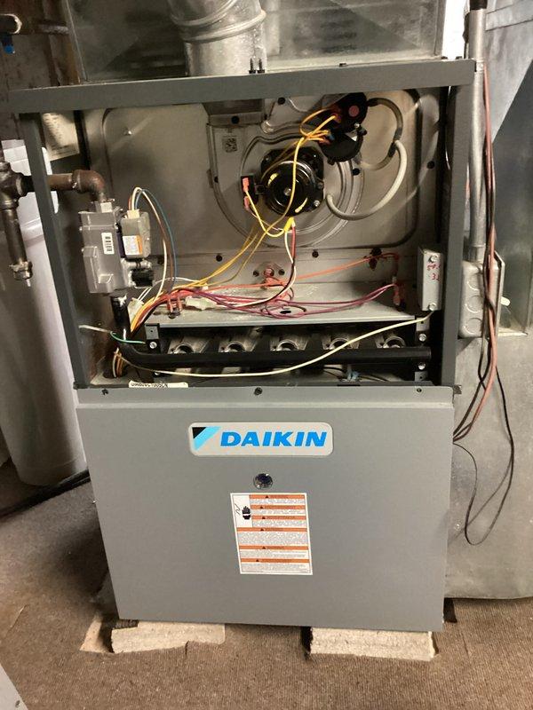 Completed comprehensive tune-up maintenance on Daikin furnace unit, including full system inspection with cabinet access for internal component evaluation. Inspected blower motor assembly, electrical connections, wiring harnesses, burner assembly, and heat exchanger components; all systems found operating within normal parameters with no deficiencies noted.