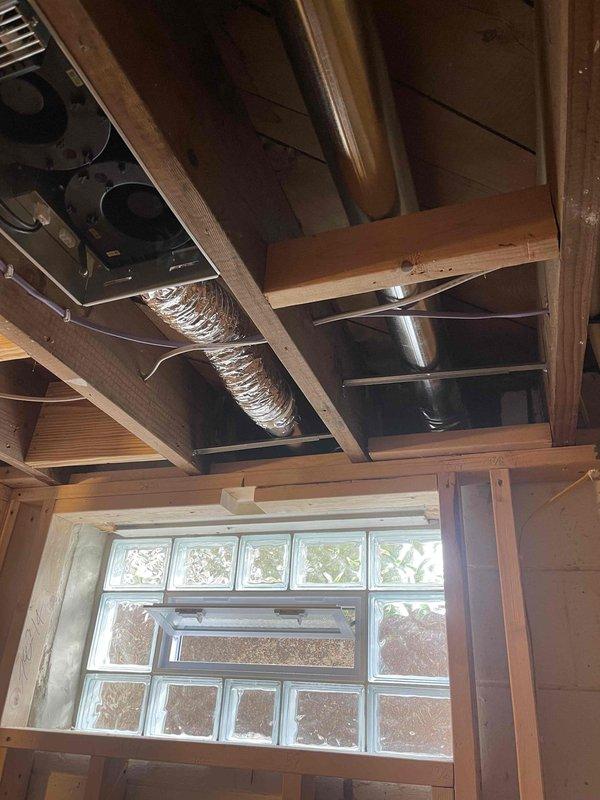 Completed HVAC ductwork installation in crawl space and upper-level framing areas. Installed flexible and rigid metal ductwork throughout the structure, routing supply and return air distribution system through confined below-grade space and connecting to air handler unit in upper framing area. Navigated challenging crawl space conditions with limited clearance and worked around existing structural elements to ensure proper airflow and system efficiency.