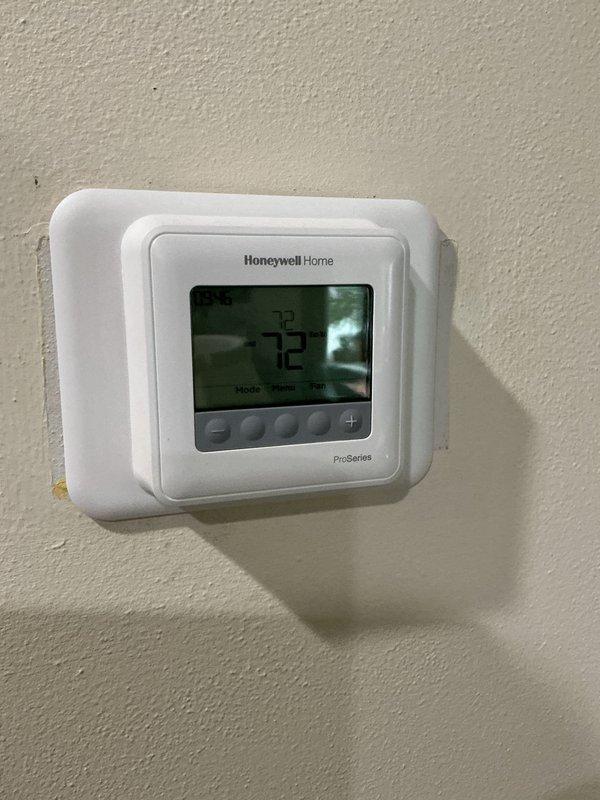 Completed scheduled heating maintenance visit as part of recurring membership agreement. Performed system inspection including internal ductwork examination using borescope camera to verify proper installation and condition of flexible ducting and support structures. Confirmed thermostat operation with Honeywell Home ProSeries unit displaying proper temperature reading of 72°F and verified all control functions are operating correctly.