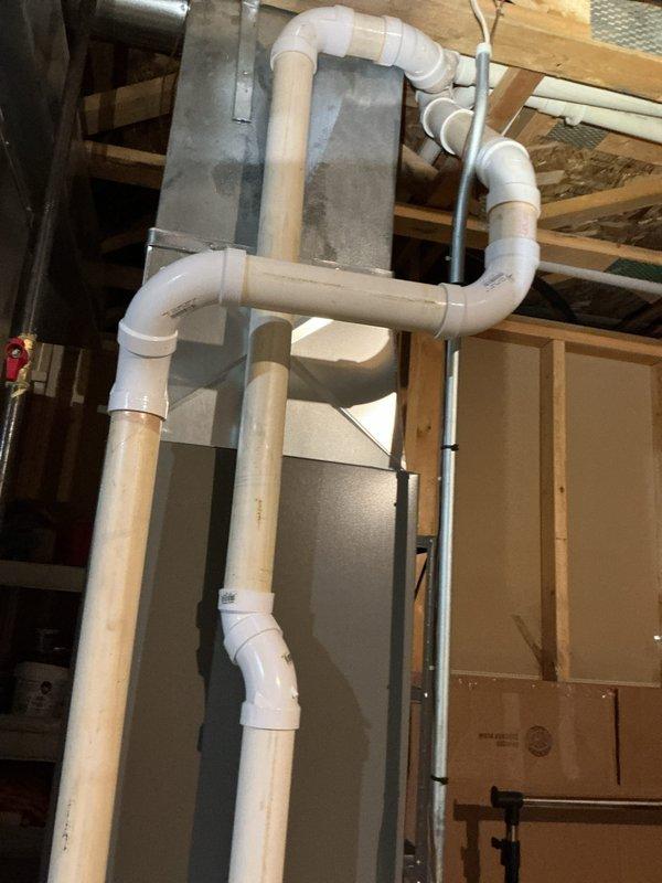 Completed comprehensive heating tune-up and safety inspection on 15-year-old residential furnace unit. Performed standard maintenance protocol including visual inspection of blower motor assembly, electrical connections, control boards, and heat exchanger; verified proper operation of PVC vent and intake piping system; checked all wire terminations and safety controls. All components found operating within normal parameters; unit photographed and returned to service.