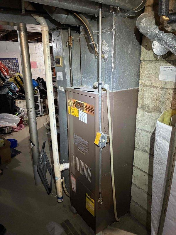 Conducted comprehensive estimate for complete HVAC system replacement including natural gas furnace, air conditioning unit, and water heater at residential property with equipment currently located in basement. Assessed existing furnace installation, electrical panel capacity with Square D breakers, and surrounding infrastructure including ductwork, copper piping, PVC plumbing, and concrete block construction to determine replacement specifications and financing options.