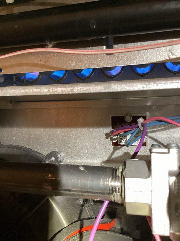 Responded to no heat call on furnace installed earlier this year. Upon inspection, found burner assembly with flame sensor requiring attention. Performed thorough cleaning of flame sensor rod using appropriate brush tool to remove carbon buildup and oxidation. Verified all electrical connections to burner assembly and control board were secure. Tested ignition sequence and confirmed proper flame detection. System restored to full heating operation with all safety controls functioning as designed.