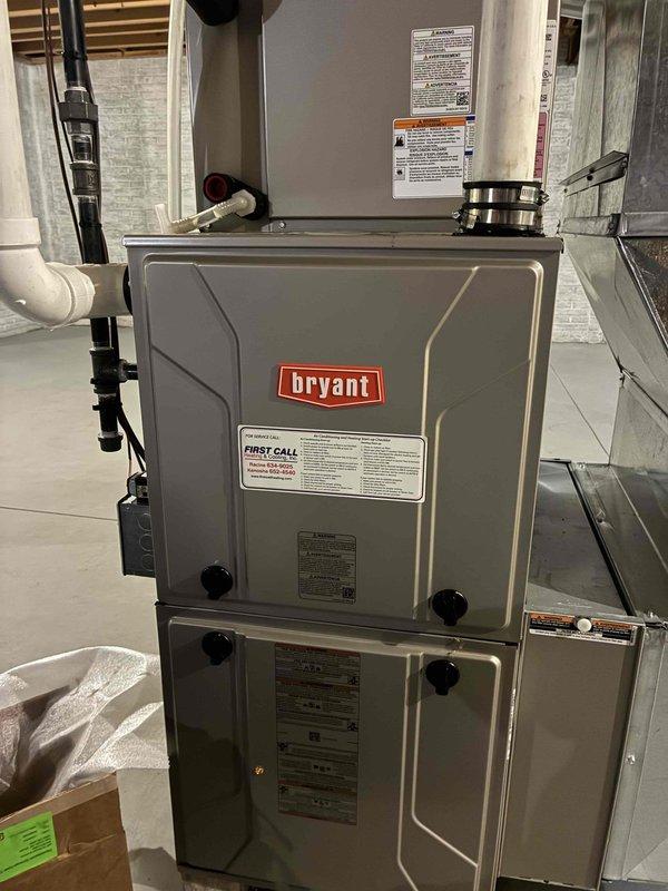 Replaced OEM exhaust 90-degree boot assembly on Bryant furnace system. Removed failed boot component with deteriorated rubber coupling and installed new factory replacement part, securing with proper hose clamp. Verified proper fit and seal of exhaust connection to prevent potential flue gas leakage and ensure safe system operation.