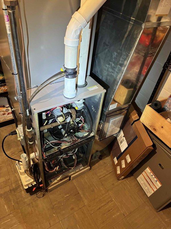 Responded to emergency service call for furnace with failed heat exchanger. Conducted thorough inspection of existing HVAC system, documented holes in heat exchanger creating safety hazard, photographed furnace unit and electrical panel, and provided comprehensive replacement estimate for new furnace system within requested timeframe.