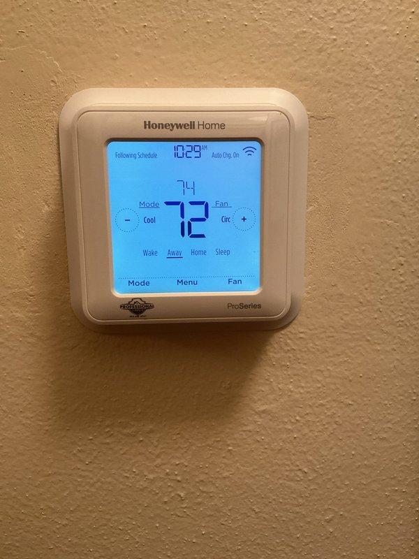 Completed scheduled heating system maintenance and tune-up as part of recurring membership agreement. Performed comprehensive furnace inspection, verified thermostat operation showing proper 72-degree setpoint and schedule programming, and conducted electrical diagnostics measuring 0.5 amp current draw to confirm safe system operation.