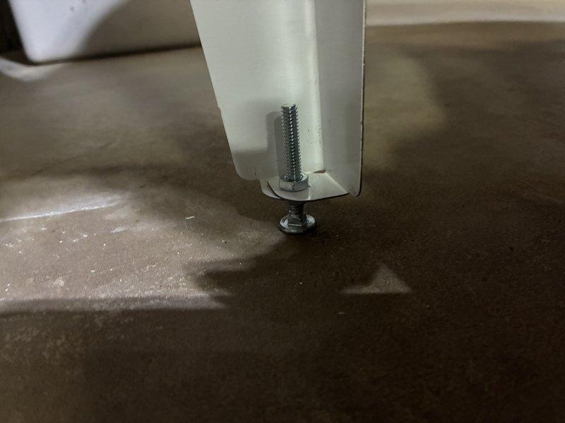 Responded to callback for utility sink installation correction. Upon arrival, assessed the mounting situation and determined that the original sink bolts were not properly secured. Reinstalled sink with bolts correctly anchored into the concrete floor using appropriate fasteners and adjustable leveling feet to ensure stable, level positioning of the utility sink unit.