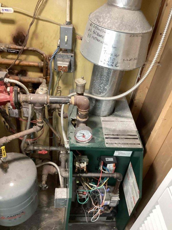 Completed comprehensive tune-up on mid-efficiency gas boiler for homeowner new to the property. Performed standard maintenance procedures including inspection of all mechanical components, pressure gauge verification, electrical connections, piping systems, and expansion tank. Provided detailed orientation on thermostat operations and explained heating system controls to familiarize homeowner with equipment functionality.