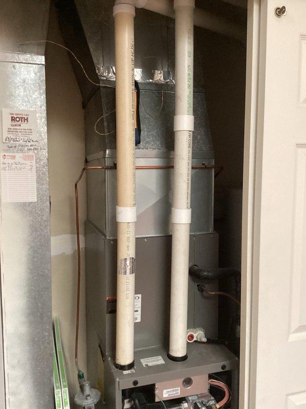 Performed a complete furnace tune-up on a gas-fired unit installed in a utility closet, including removal of the lower front panel to inspect the gas valve assembly, inducer/blower motor, burner compartment, control board, and wiring connections. Verified the PVC venting, gas supply line and fittings, condensate drain components, and transition ductwork were secure and sealed, with no signs of rust, frost, or visible damage. Unit was reassembled and left in proper working condition.