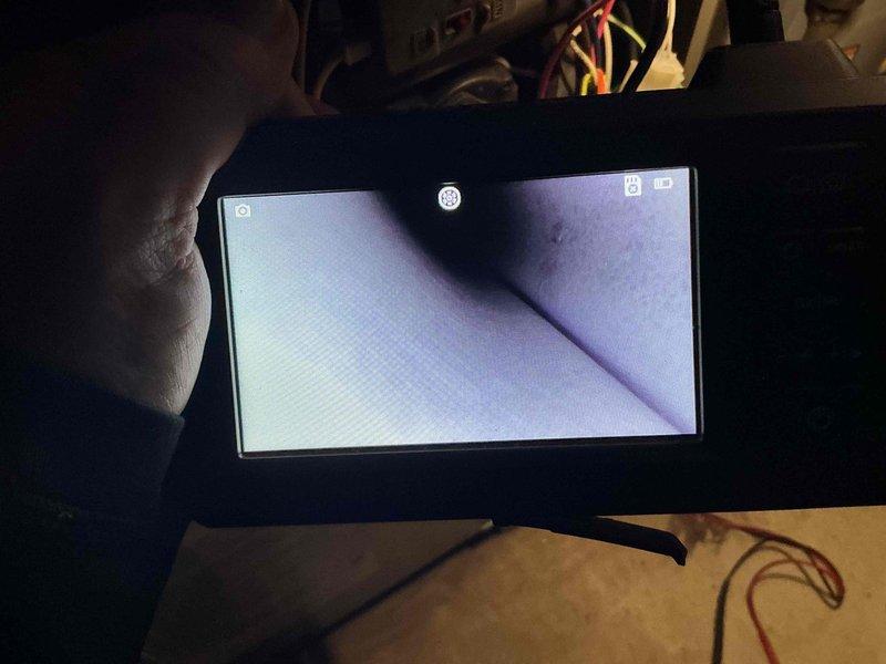 Performed a tune-up on the HVAC system, including an inspection of the interior passages and components with a borescope camera to check for obstructions or buildup. Measured electrical loads on the equipment with a true RMS clamp meter to verify proper amp draw and confirm the system is operating within normal parameters.