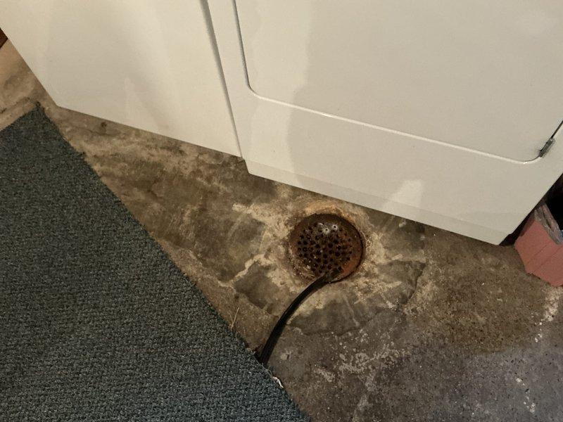 Performed an on-site evaluation for replacement of the basement furnace, which had been shut down due to a failed heat exchanger. Inspected the installation area, including the nearby floor drain and the electrical service panel, to verify clearances and confirm available circuits for the new equipment. Confirmed the attic furnace (2017) is operating without issues and does not require replacement, and documented findings to support the replacement estimate for the basement unit.