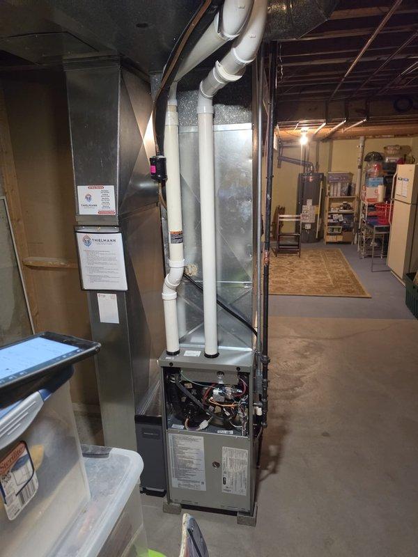 Installed a new upflow gas furnace with a new F100 cabinet and connected it to the existing supply plenum and ductwork. Adapted the combustion air/vent piping to the existing PVC, reconnected the gas line, and installed a new S40 thermostat. Electrical connections were completed by a licensed electrician under permit, and the system was started up and verified for proper operation.