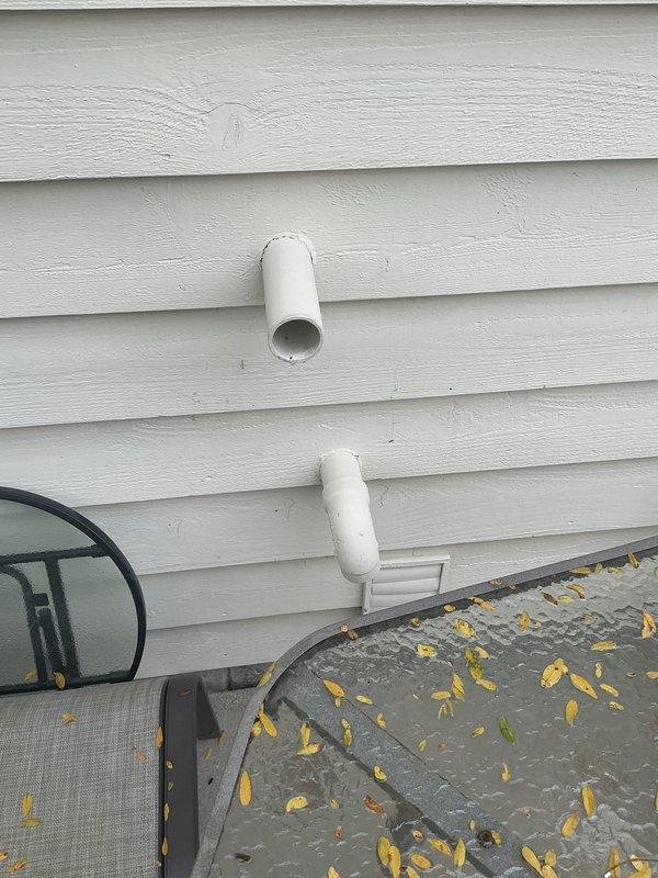 Performed an in-home estimate for replacement of the natural gas furnace (basement-installed) and air conditioning system, with optional whole-home humidifier addition. Evaluated the existing dial-style thermostat and documented the exterior PVC combustion air intake/exhaust terminations and adjacent vent to assess venting configuration and compatibility with new equipment.