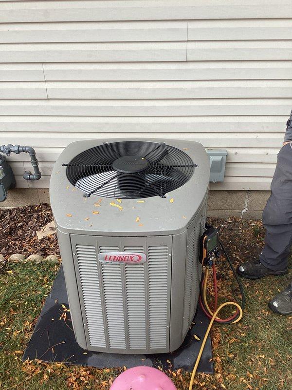 Replaced the failed evaporator coil under manufacturer parts warranty, including removal of the defective coil, installation of the new coil, and reconnection of the condensate drain and refrigerant lines. Connected manifold gauges to the Lennox condensing unit to evacuate, recharge, and verify proper refrigerant charge and system operation after the repair.