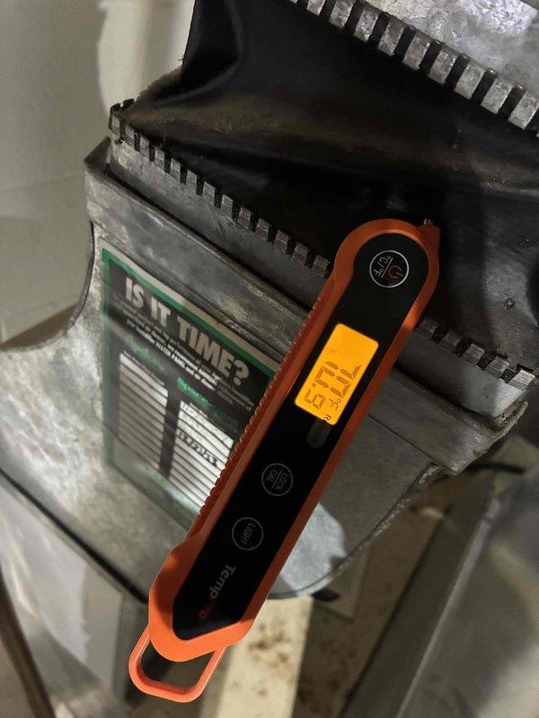 Performed diagnostic evaluation of the gas furnace in response to a reported odor on startup, including inspection of the plenum and supply plenum connection, temperature measurements, and electrical checks of blower motor amperage (1.95 A) with a true RMS clamp meter. Documented system condition and applied a service sticker to the unit for future maintenance reference.