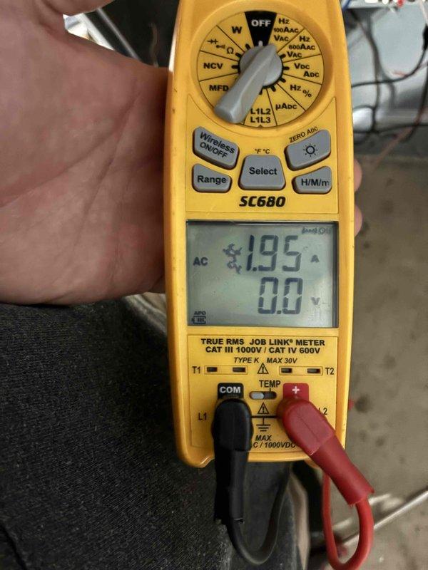 Performed diagnostic evaluation of the gas furnace in response to a reported odor on startup, including inspection of the plenum and supply plenum connection, temperature measurements, and electrical checks of blower motor amperage (1.95 A) with a true RMS clamp meter. Documented system condition and applied a service sticker to the unit for future maintenance reference.