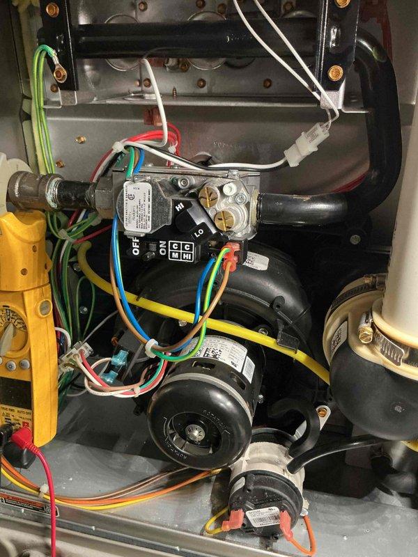 Responded to a no-heat call on a Carrier gas furnace and performed a diagnostic evaluation, inspecting the gas control valve, inducer blower motor, pressure switch, and associated wiring and venting. Used a clamp meter to test electrical components and isolate the cause of the heating failure.