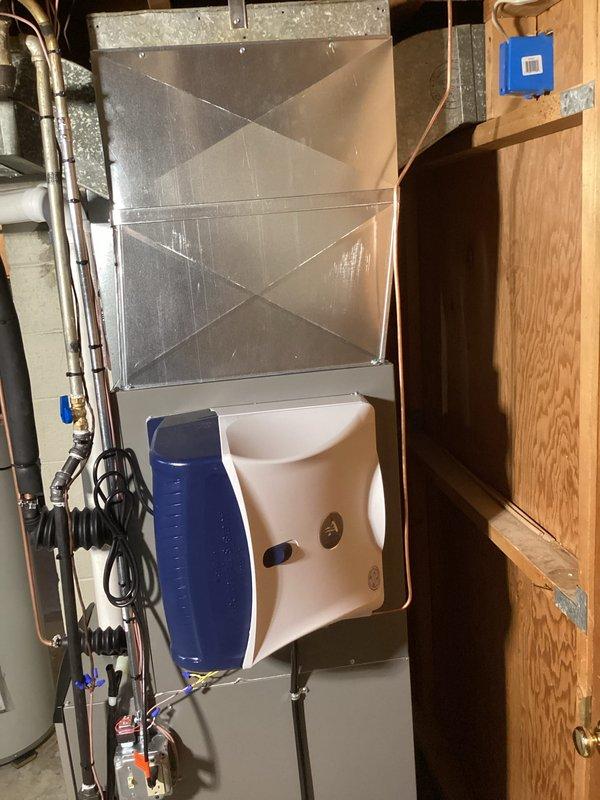 Installed a new Lennox high-efficiency gas furnace with PVC intake/exhaust venting, condensate drain routed to the floor drain, and a whole-house humidifier mounted on the supply plenum, along with an AC system and a 40-gallon power vent water heater. All work was permitted, with electrical connections completed by a licensed electrician, and the system was connected to the existing ductwork and controls.