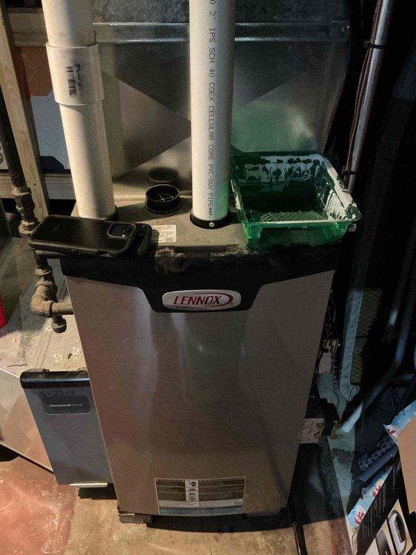 Responded to a no-heat call on a Lennox gas furnace displaying fault code E207. Inspected the integrated furnace control board, wiring harness, and connections, finding no visible signs of damage, burning, or corrosion, and performed diagnostics to resolve the fault condition and restore heating operation. The unit is covered under the remaining 10-year parts warranty.