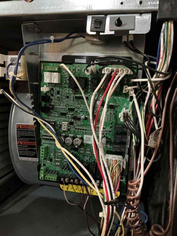Responded to a no-heat call on a Lennox gas furnace displaying fault code E207. Inspected the integrated furnace control board, wiring harness, and connections, finding no visible signs of damage, burning, or corrosion, and performed diagnostics to resolve the fault condition and restore heating operation. The unit is covered under the remaining 10-year parts warranty.