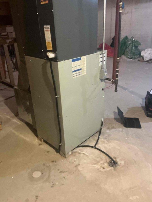 Performed an on-site evaluation of a 15-16 year old Trane gas furnace and found rust and corrosion inside the heat exchanger chambers, indicating the unit is nearing end of service life. Inspected the burner assembly, blower, control board, venting, ductwork, and condensate drain routing, documented conditions with photos, and provided a furnace replacement estimate.